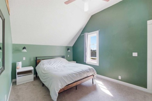 432 Centre Avenue Ne, Airdrie, AB - Indoor Photo Showing Bedroom