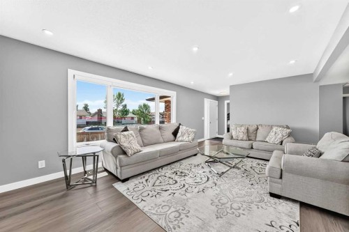 4932 Rundlehorn Drive Ne, Calgary, AB - Indoor Photo Showing Living Room