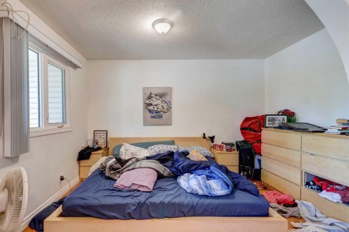 202 Olympia Drive Se, Calgary, AB - Indoor Photo Showing Bedroom