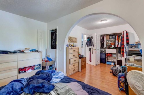 202 Olympia Drive Se, Calgary, AB - Indoor Photo Showing Bedroom