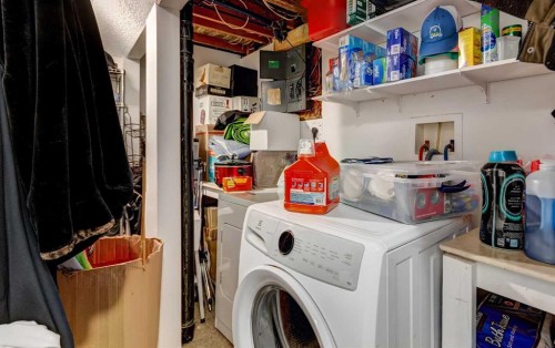 202 Olympia Drive Se, Calgary, AB - Indoor Photo Showing Laundry Room