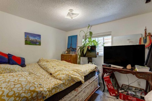 202 Olympia Drive Se, Calgary, AB - Indoor Photo Showing Bedroom