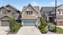 172 Riviera Way, Cochrane, AB  - Outdoor With Facade 