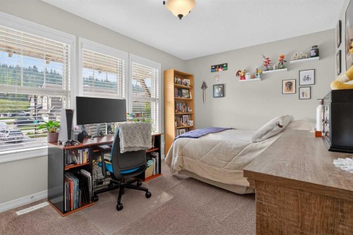172 Riviera Way, Cochrane, AB - Indoor Photo Showing Bedroom