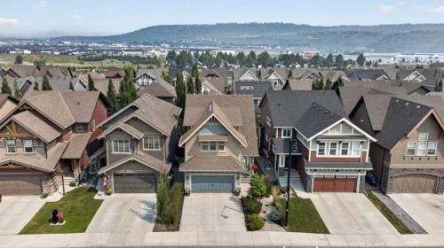 172 Riviera Way, Cochrane, AB - Outdoor With Facade