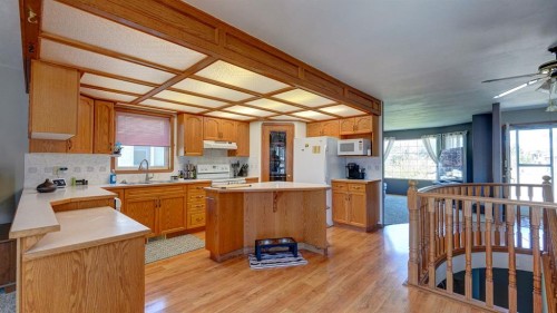 529 53 Avenue West, Claresholm, AB - Indoor Photo Showing Kitchen With Double Sink
