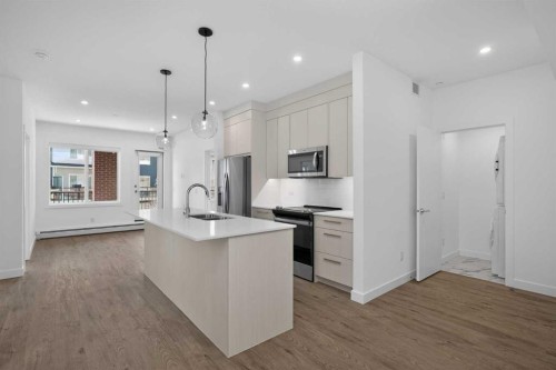 3201-6 Merganser Drive West, Chestermere, AB - Indoor Photo Showing Kitchen With Upgraded Kitchen