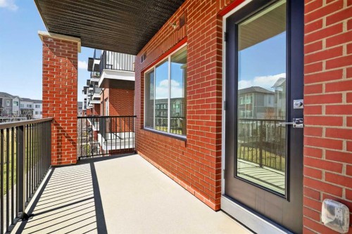 3201-6 Merganser Drive West, Chestermere, AB - Outdoor With Balcony With Exterior