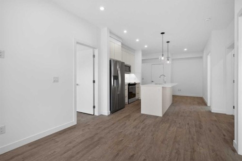3201-6 Merganser Drive West, Chestermere, AB - Indoor Photo Showing Kitchen