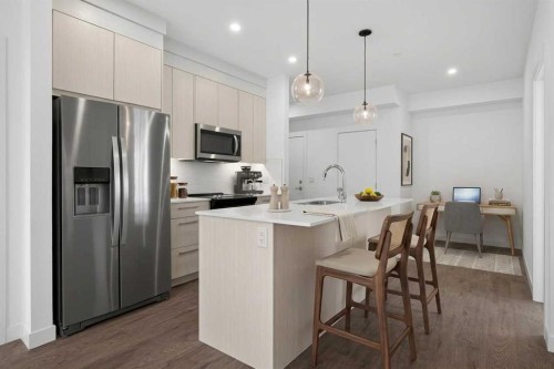 3201-6 Merganser Drive West, Chestermere, AB - Indoor Photo Showing Kitchen With Stainless Steel Kitchen With Upgraded Kitchen