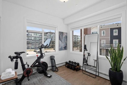 3201-6 Merganser Drive West, Chestermere, AB - Indoor Photo Showing Gym Room