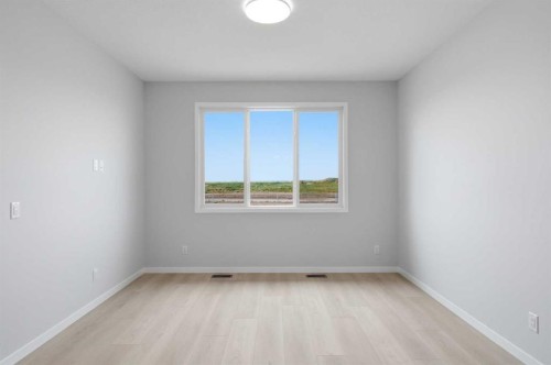 37 Rosemary Gardens Se, Calgary, AB - Indoor Photo Showing Other Room