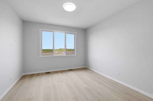 37 Rosemary Gardens Se, Calgary, AB - Indoor Photo Showing Other Room