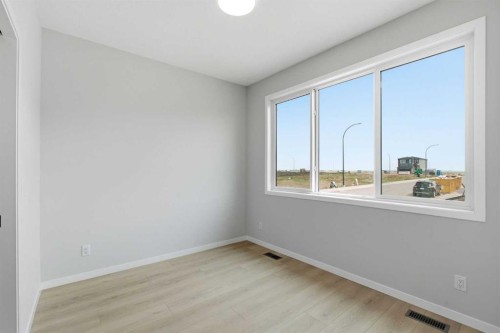37 Rosemary Gardens Se, Calgary, AB - Indoor Photo Showing Other Room