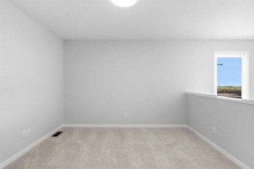 37 Rosemary Gardens Se, Calgary, AB - Indoor Photo Showing Other Room