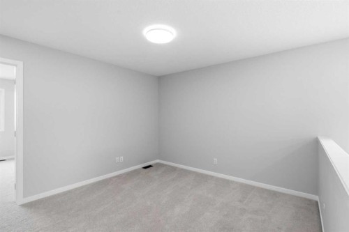 37 Rosemary Gardens Se, Calgary, AB - Indoor Photo Showing Other Room