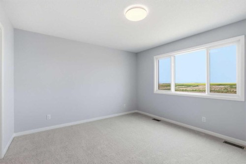 37 Rosemary Gardens Se, Calgary, AB - Indoor Photo Showing Other Room