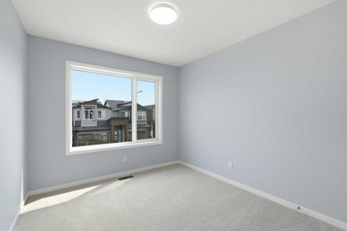 37 Rosemary Gardens Se, Calgary, AB - Indoor Photo Showing Other Room