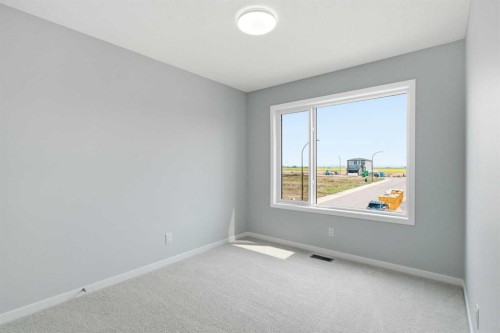 37 Rosemary Gardens Se, Calgary, AB - Indoor Photo Showing Other Room