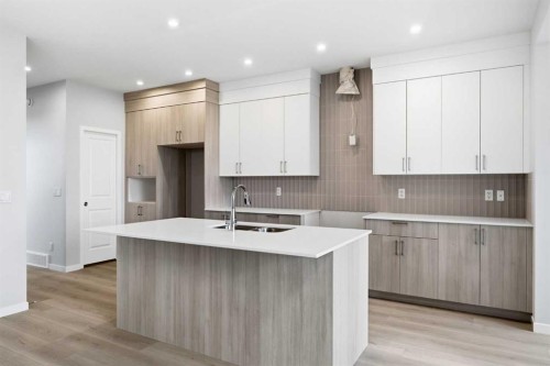 37 Rosemary Gardens Se, Calgary, AB - Indoor Photo Showing Kitchen With Double Sink With Upgraded Kitchen