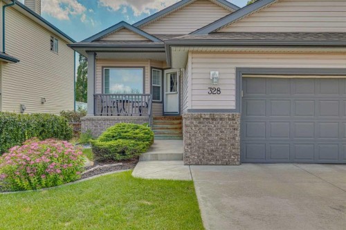 328 Cove Road, Chestermere, AB - Outdoor With Deck Patio Veranda