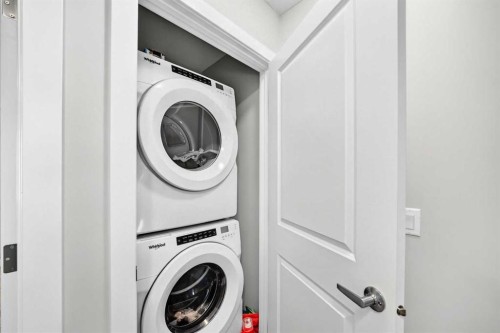1213 Sage Hill Grove Nw, Calgary, AB - Indoor Photo Showing Laundry Room