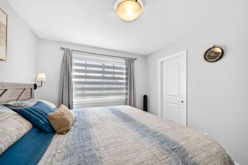 1213 Sage Hill Grove Nw, Calgary, AB - Indoor Photo Showing Bedroom