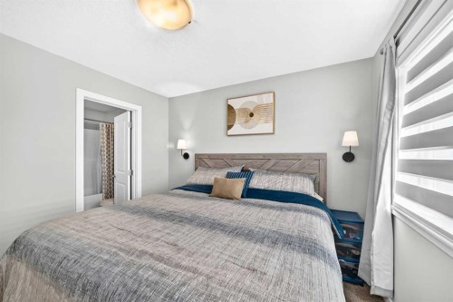1213 Sage Hill Grove Nw, Calgary, AB - Indoor Photo Showing Bedroom