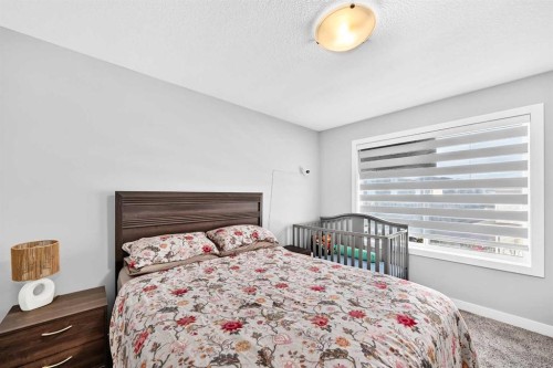 1213 Sage Hill Grove Nw, Calgary, AB - Indoor Photo Showing Bedroom