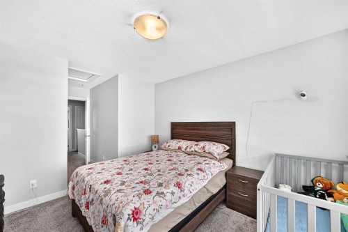 1213 Sage Hill Grove Nw, Calgary, AB - Indoor Photo Showing Bedroom