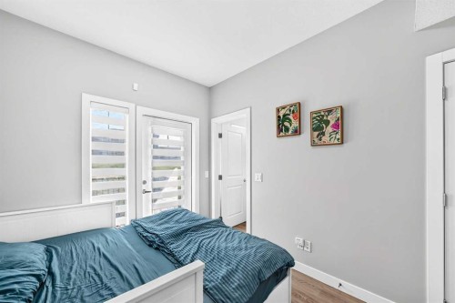 1213 Sage Hill Grove Nw, Calgary, AB - Indoor Photo Showing Bedroom