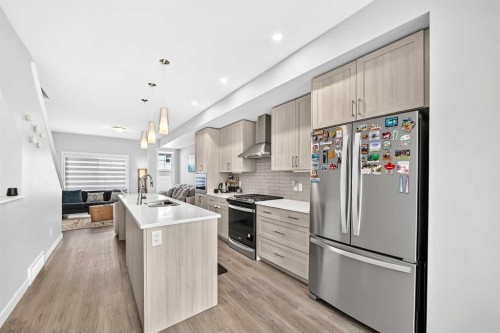 1213 Sage Hill Grove Nw, Calgary, AB - Indoor Photo Showing Kitchen With Upgraded Kitchen