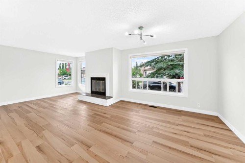 28 Whiteram Close Ne, Calgary, AB - Indoor Photo Showing Living Room With Fireplace