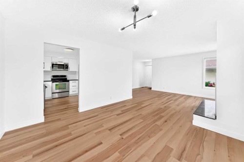 28 Whiteram Close Ne, Calgary, AB - Indoor Photo Showing Other Room