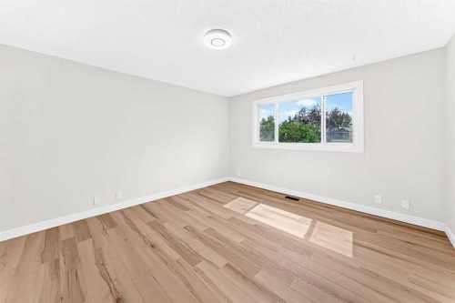 28 Whiteram Close Ne, Calgary, AB - Indoor Photo Showing Other Room