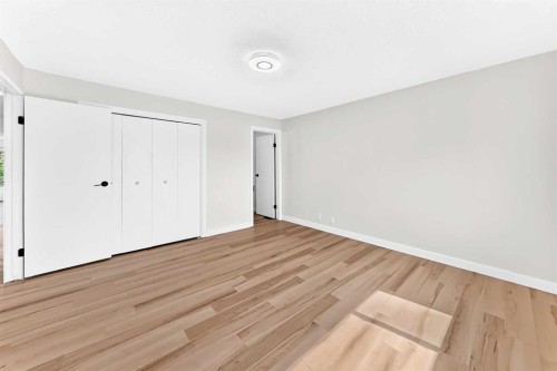 28 Whiteram Close Ne, Calgary, AB - Indoor Photo Showing Other Room