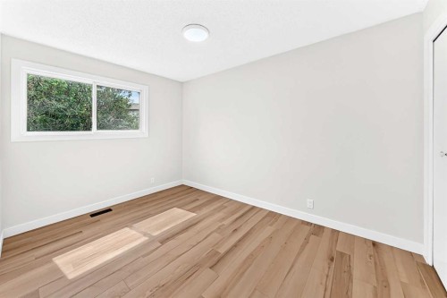 28 Whiteram Close Ne, Calgary, AB - Indoor Photo Showing Other Room