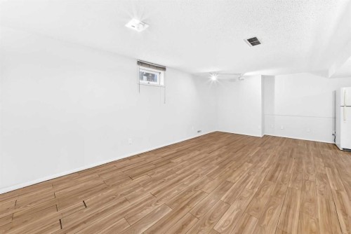 28 Whiteram Close Ne, Calgary, AB - Indoor Photo Showing Other Room
