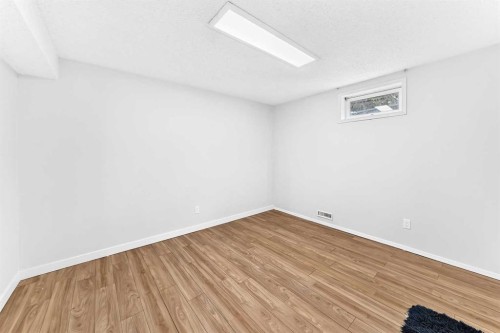 28 Whiteram Close Ne, Calgary, AB - Indoor Photo Showing Other Room