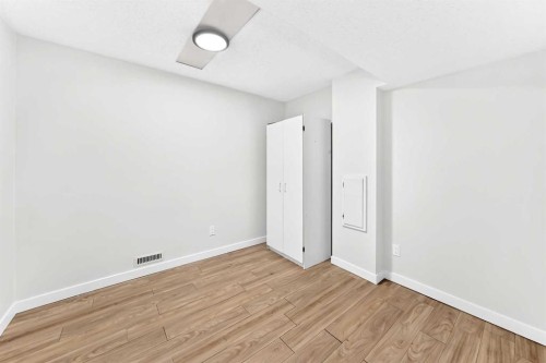 28 Whiteram Close Ne, Calgary, AB - Indoor Photo Showing Other Room