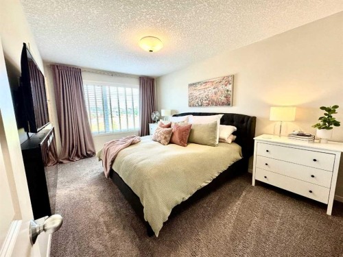 35 Walden Mount Se, Calgary, AB - Indoor Photo Showing Bedroom