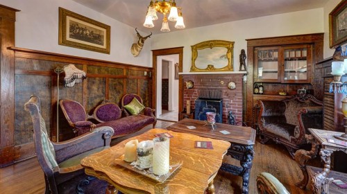 4309 2 Street West, Claresholm, AB - Indoor With Fireplace