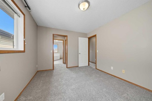 142 Arbour Meadows Close Nw, Calgary, AB - Indoor Photo Showing Other Room