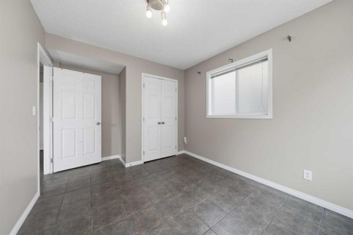 142 Arbour Meadows Close Nw, Calgary, AB - Indoor Photo Showing Other Room
