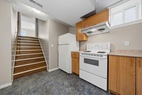 142 Arbour Meadows Close Nw, Calgary, AB - Indoor Photo Showing Kitchen
