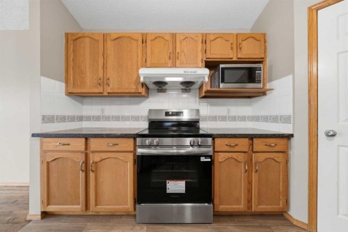 142 Arbour Meadows Close Nw, Calgary, AB - Indoor Photo Showing Kitchen