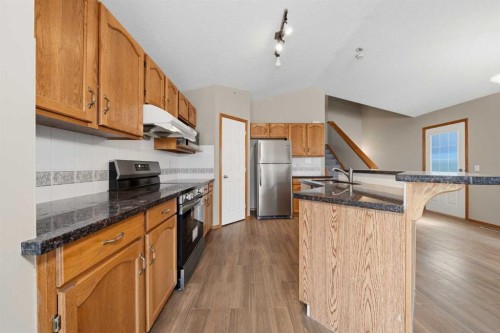 142 Arbour Meadows Close Nw, Calgary, AB - Indoor Photo Showing Kitchen