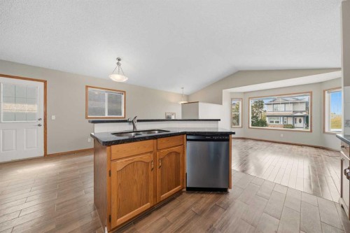142 Arbour Meadows Close Nw, Calgary, AB - Indoor Photo Showing Kitchen With Double Sink