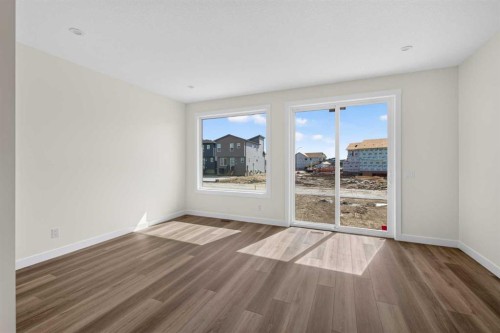 138 Starling Boulevard Nw, Calgary, AB - Indoor Photo Showing Other Room