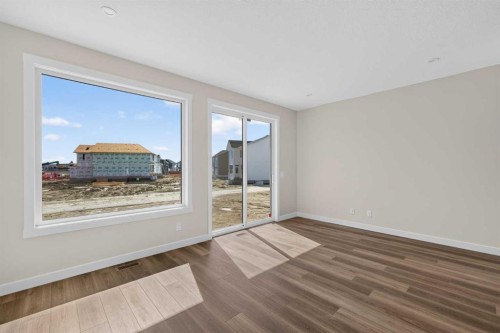 138 Starling Boulevard Nw, Calgary, AB - Indoor Photo Showing Other Room